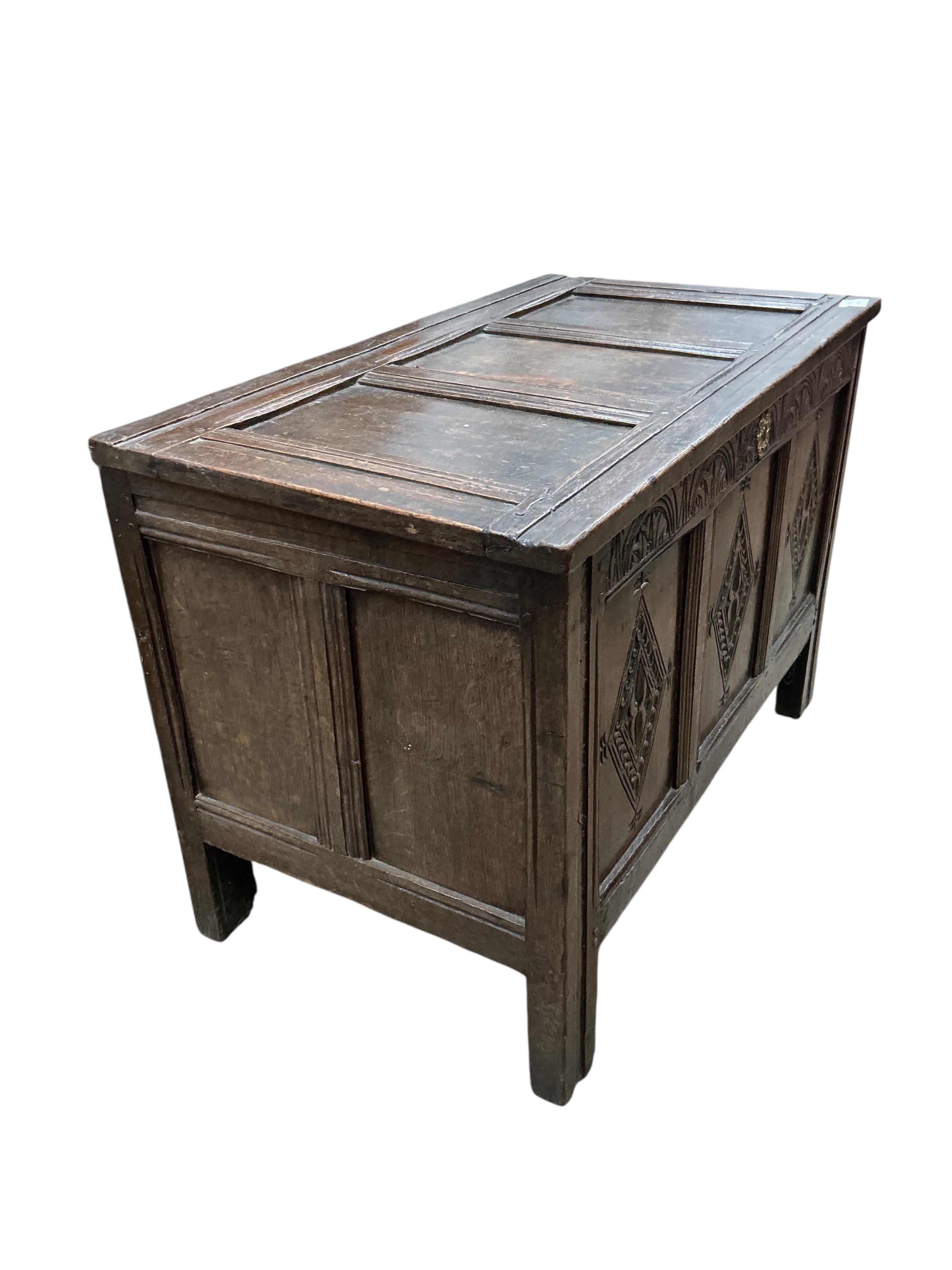 A small 17th century panelled oak coffer, width 87cm, depth 48cm, height 60cm